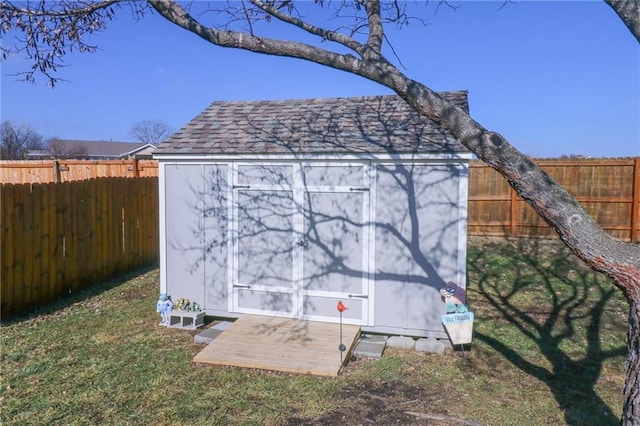 view of outbuilding with a lawn