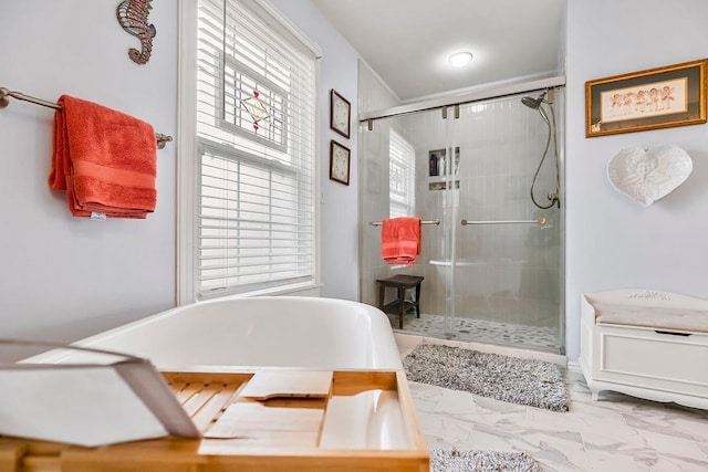 bathroom featuring plus walk in shower