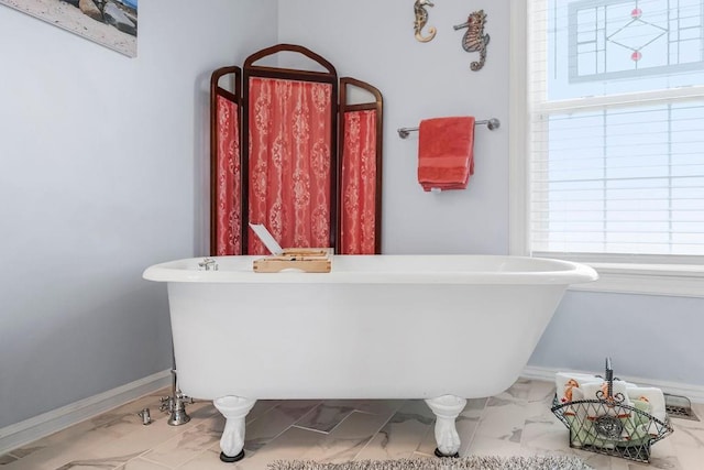 bathroom featuring a tub