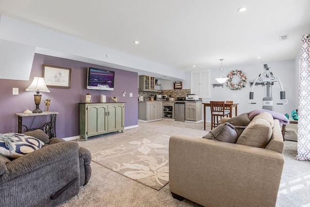 living room featuring light colored carpet