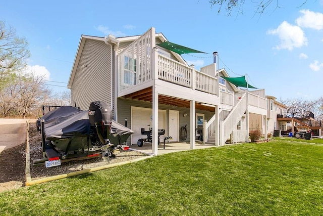 back of house featuring a patio, a yard, central AC, and a deck