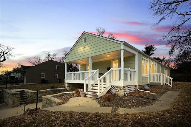 view of front of home featuring covered porch