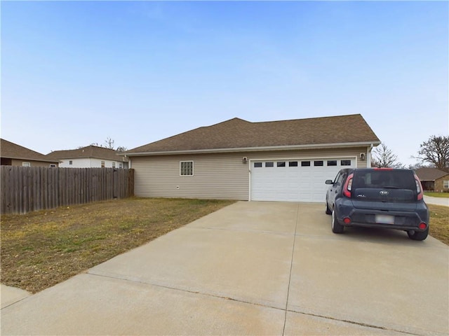 view of side of home with a lawn