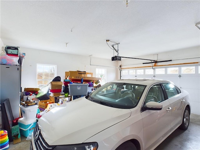 garage featuring a garage door opener