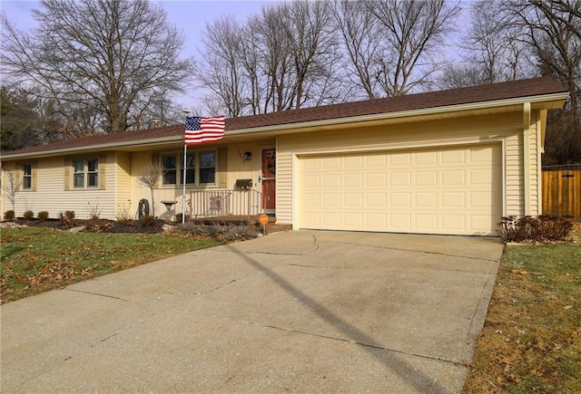 single story home featuring a garage, covered porch, and a front lawn