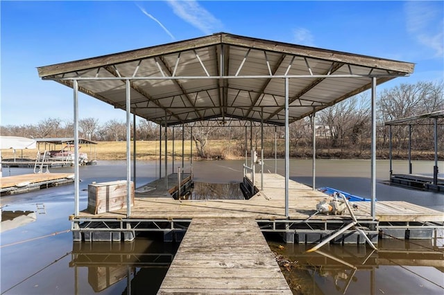 view of dock with a water view