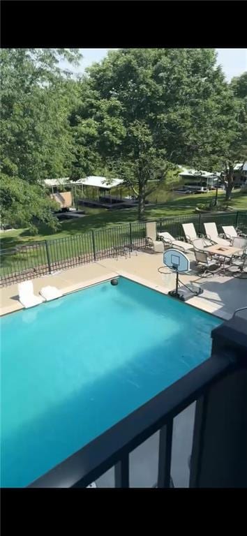 view of pool featuring a patio area