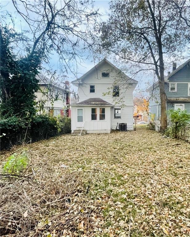 back of property featuring central air condition unit