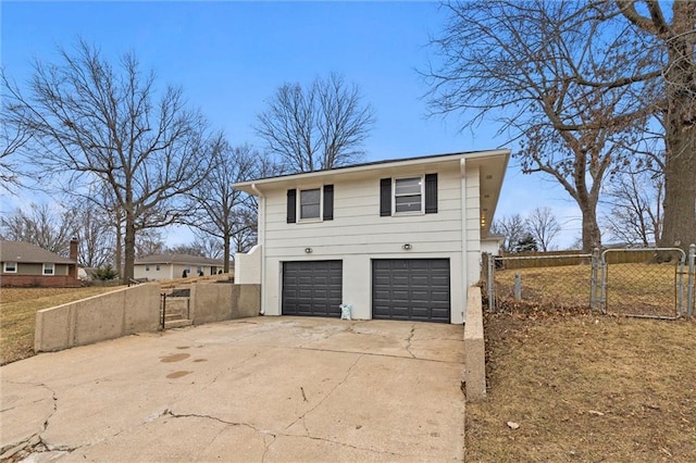 view of side of property featuring a garage