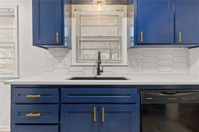 kitchen with blue cabinetry, a healthy amount of sunlight, black dishwasher, and sink