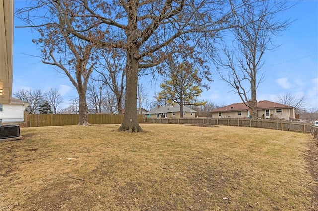 view of yard featuring central AC unit