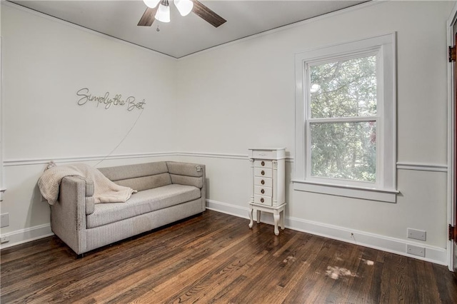 living area with dark hardwood / wood-style floors and ceiling fan