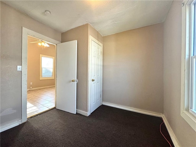 unfurnished bedroom with carpet