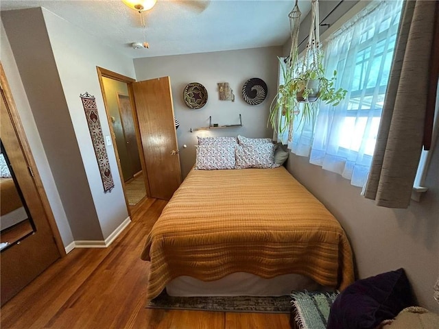 bedroom featuring hardwood / wood-style floors