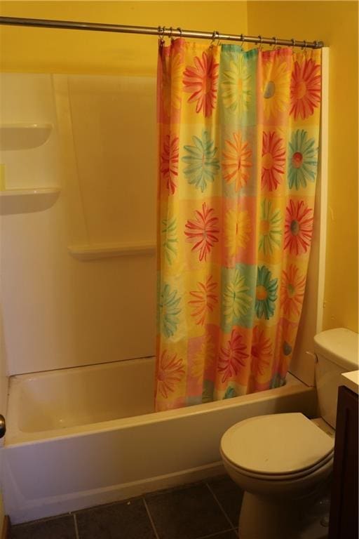 full bathroom featuring tile patterned flooring, vanity, shower / bath combo, and toilet