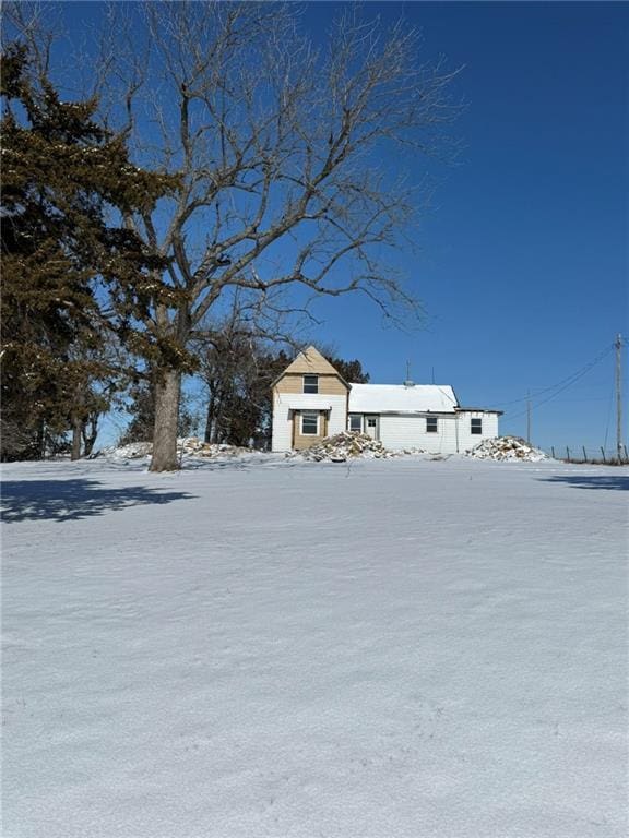 view of yard covered in snow