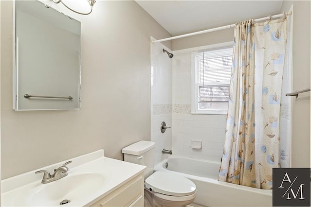 full bathroom featuring toilet, vanity, and shower / bath combo with shower curtain