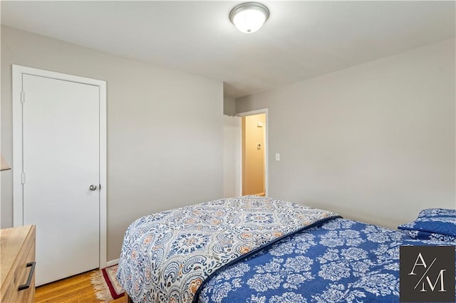 bedroom featuring hardwood / wood-style flooring