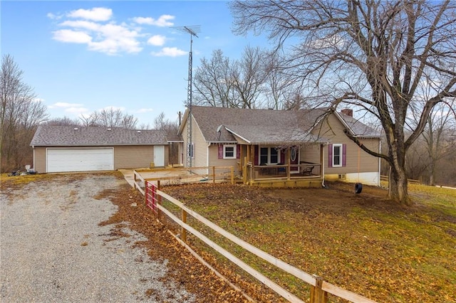 view of front of home with a garage and covered porch