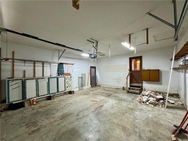 1120 N Oak St, Nevada, MO 64772 - garage with a garage door opener
