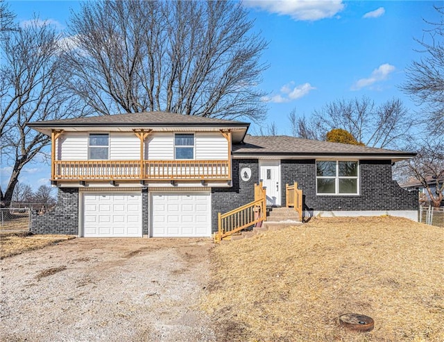 view of front of property featuring a garage