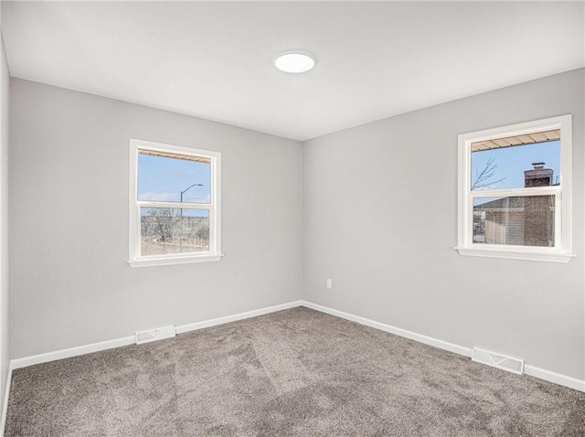 view of carpeted spare room