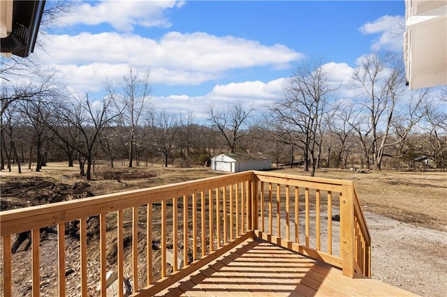 wooden deck with an outdoor structure