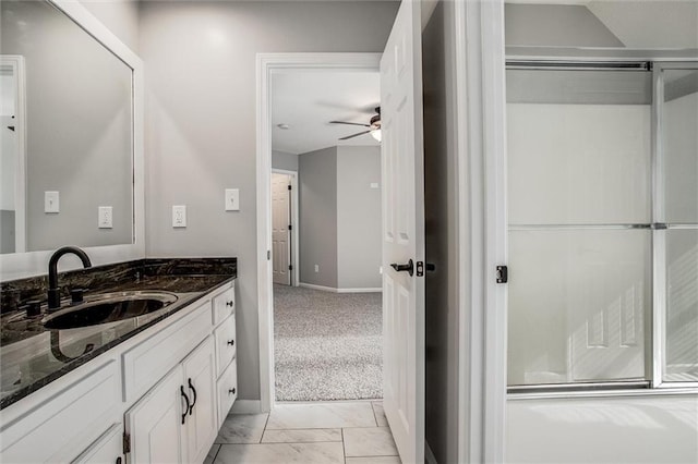 4300 SE Willow Ridge Dr, Blue Springs, MO 64014 - bathroom with ceiling fan, vanity, and a shower with door