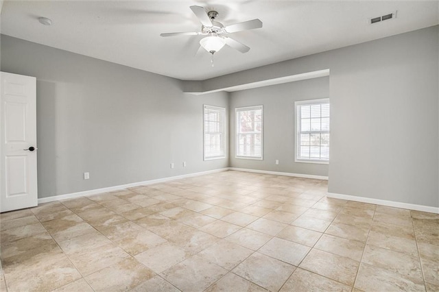 4300 SE Willow Ridge Dr, Blue Springs, MO 64014 - tiled spare room featuring ceiling fan