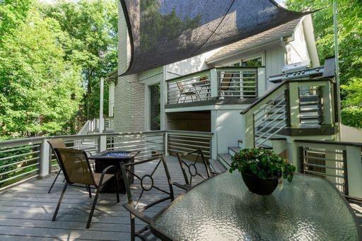 wooden deck with outdoor dining area