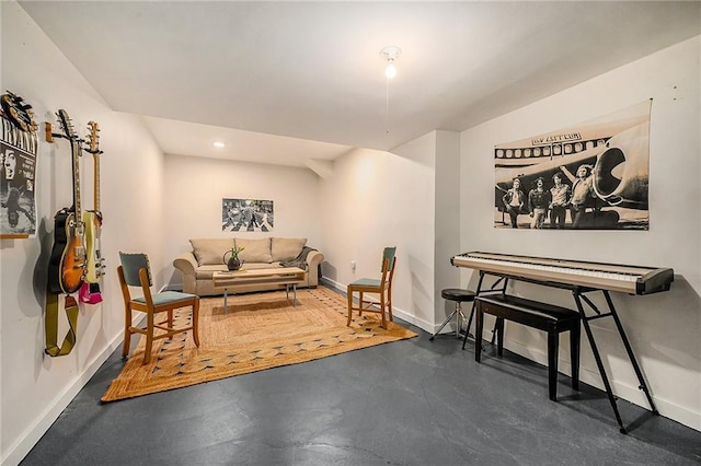 living area with recessed lighting and baseboards