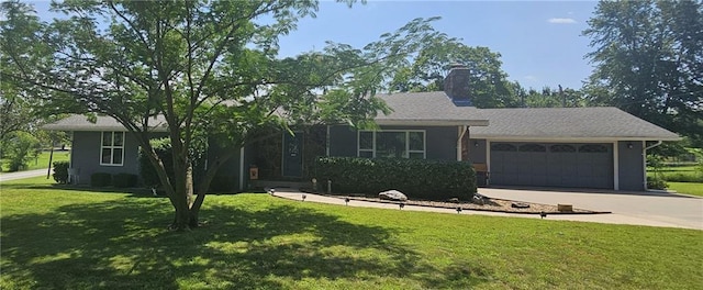 ranch-style home with a garage and a front lawn