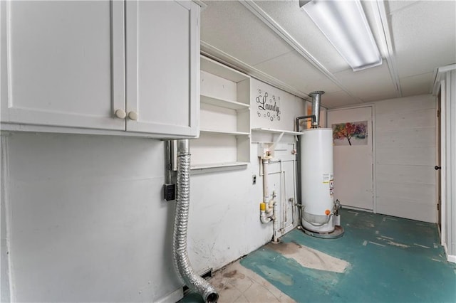 utility room featuring gas water heater