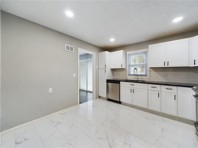 kitchen with white cabinetry, dishwasher, tasteful backsplash, and sink