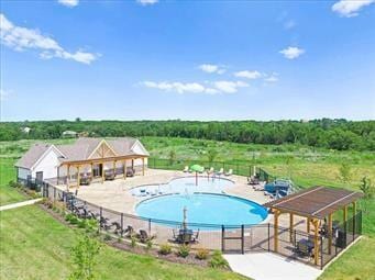 community pool featuring fence