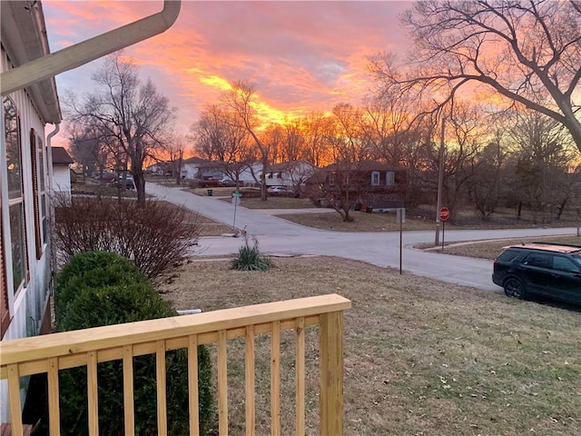 view of yard at dusk