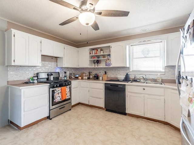 kitchen featuring white cabinetry, appliances with stainless steel finishes, sink, and a wealth of natural light