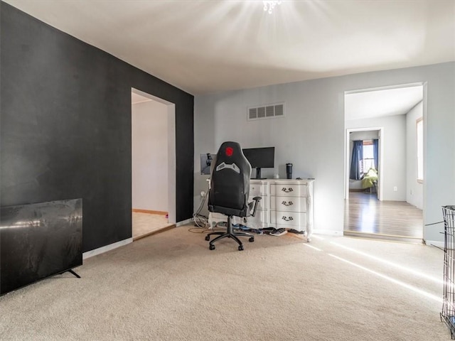 home office featuring light carpet