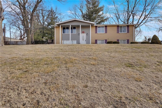 view of front of property with a front lawn