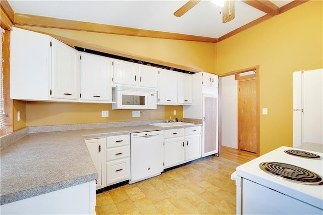 kitchen with sink, white appliances, ceiling fan, white cabinetry, and vaulted ceiling