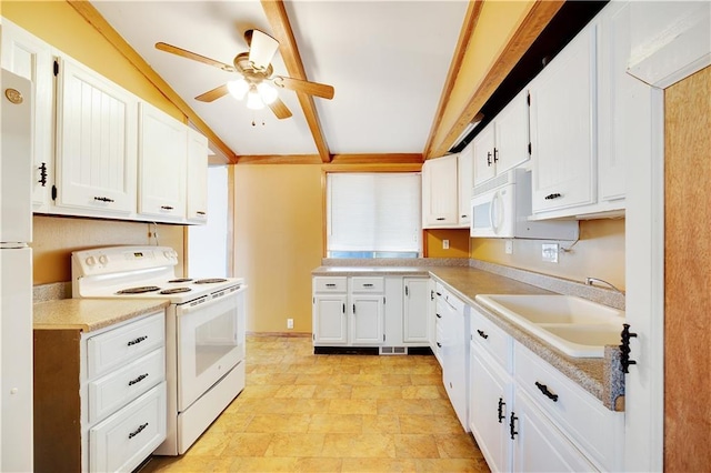 kitchen featuring sink, white appliances, ceiling fan, beam ceiling, and white cabinets