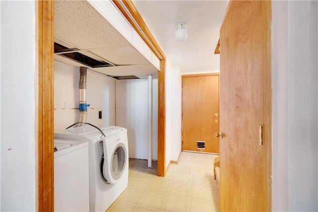 laundry room with washer and clothes dryer