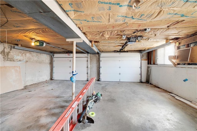 garage featuring a garage door opener