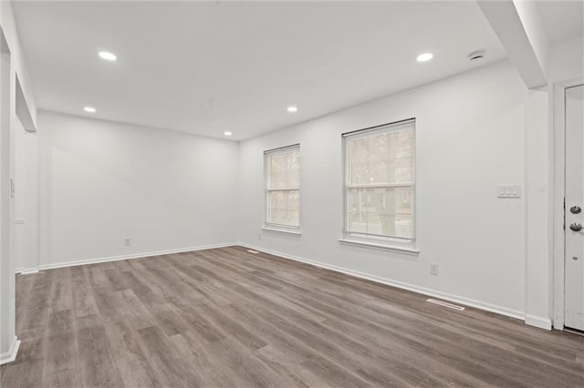 empty room featuring hardwood / wood-style floors