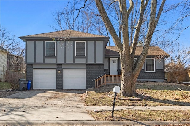 view of front facade featuring an attached garage, concrete driveway, and brick siding