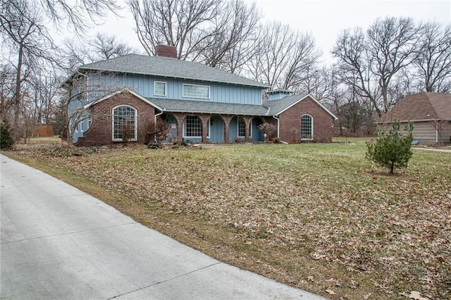 front of property with a garage and a front yard