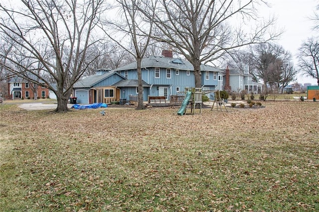 view of playground with a yard