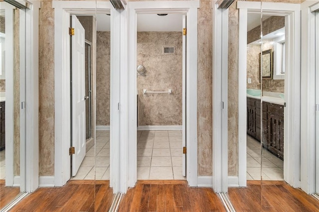 corridor featuring tile patterned floors