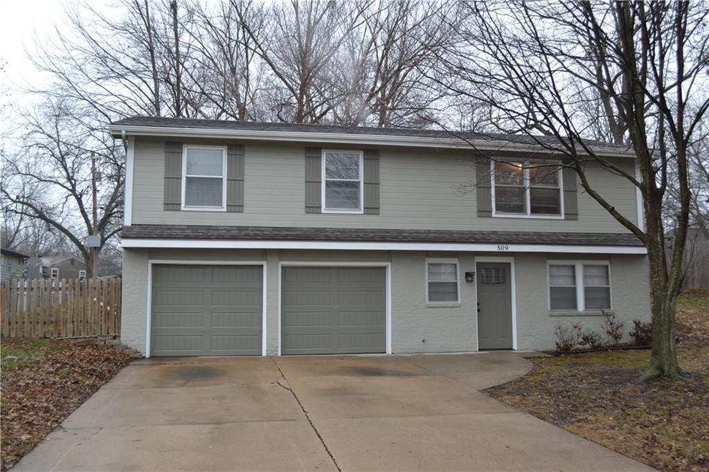 front of property with a garage