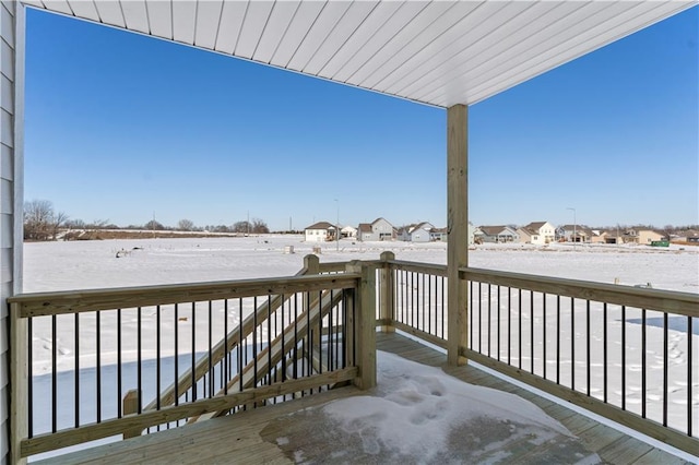 view of snow covered deck